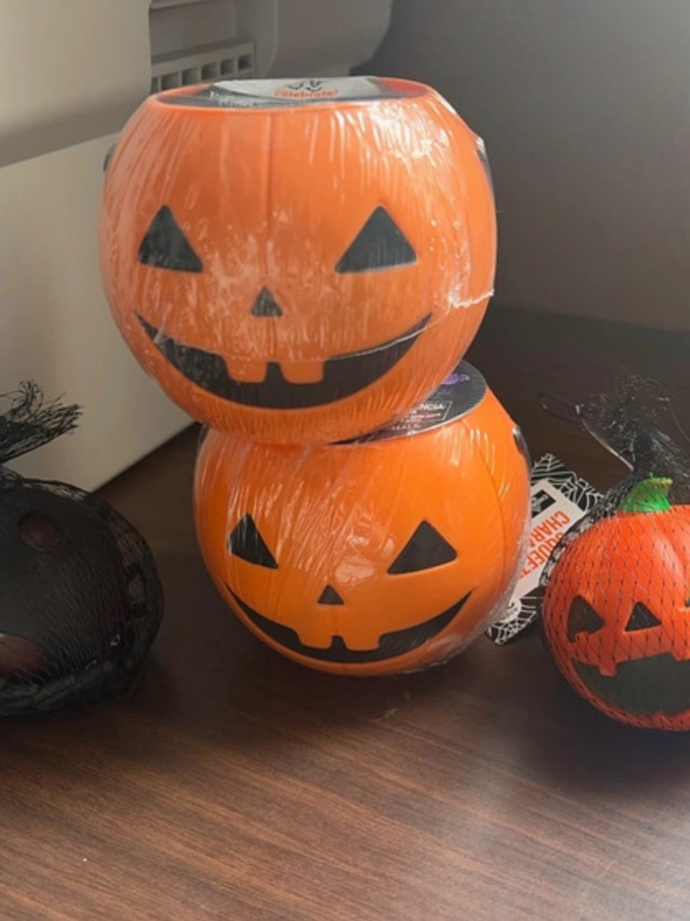 2 squishy filled buckets and 2 Halloween squishy toys